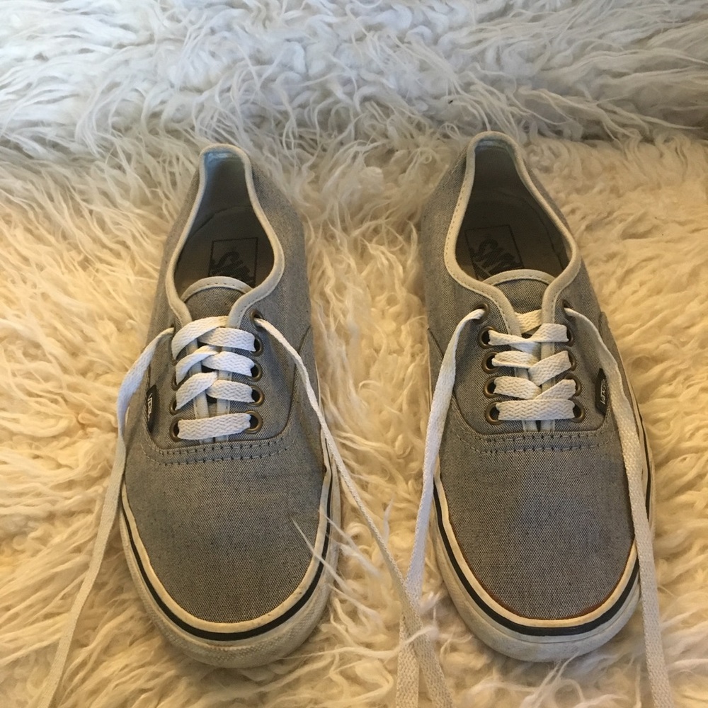 Gray and white vans. Men’s 6 1/2 women’s eight .
